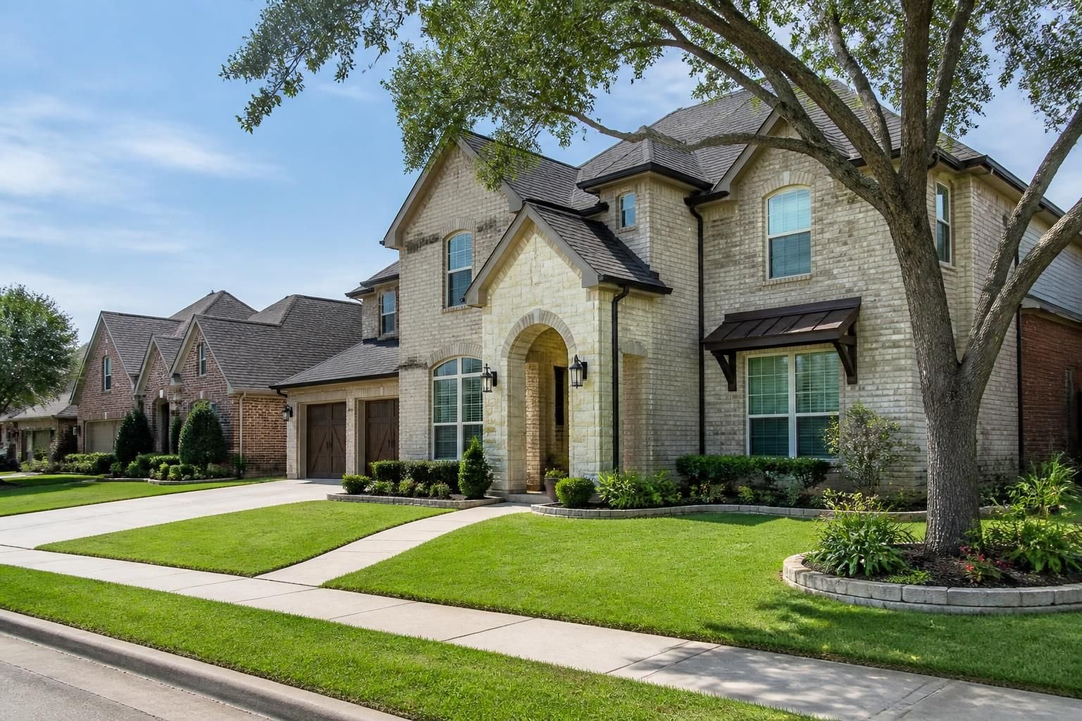 Arlington suburb with clean homes and visible roof structures