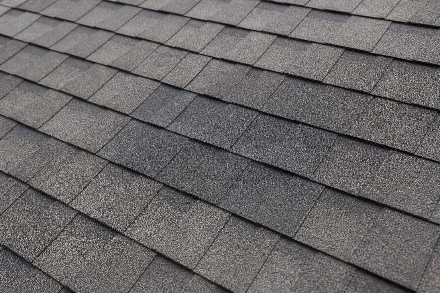 Repaired roof section blended neatly with surrounding shingles
